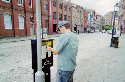 Doug Feeding Parking Meter